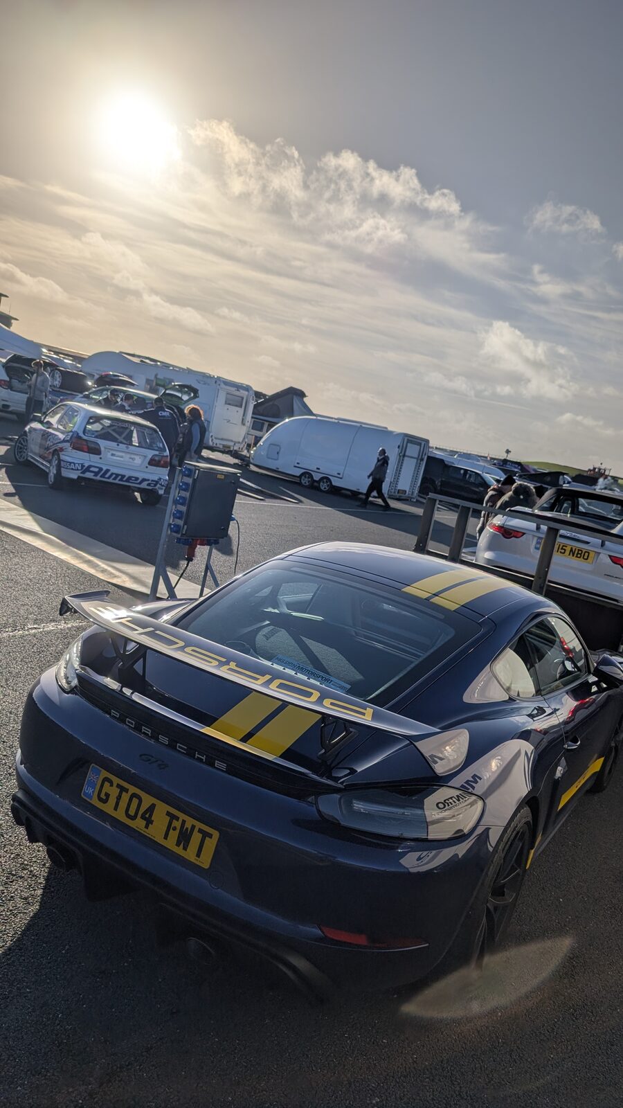 A Porsche 718 Cayman GT4 in the paddock at Anglesey Circuit for Supercar Saturday.